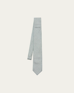 Zielony jedwabny krawat w geometryczny wzór